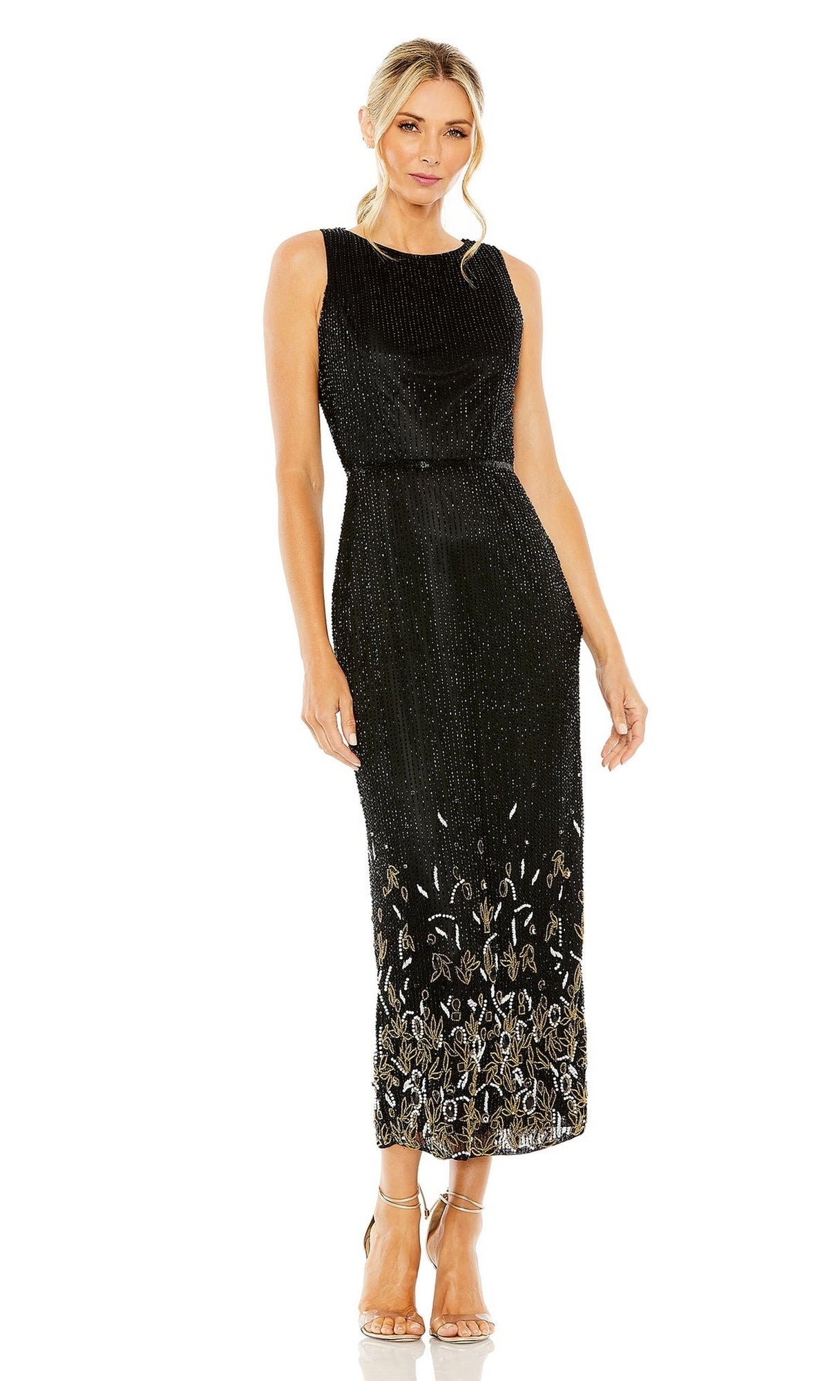 Woman wearing the Knee Length Wedding Guest Dress 5796 by Mac Duggal, a sleeveless black fitted dress with silver and gold sequin detailing near the hem, paired with strappy nude heels.